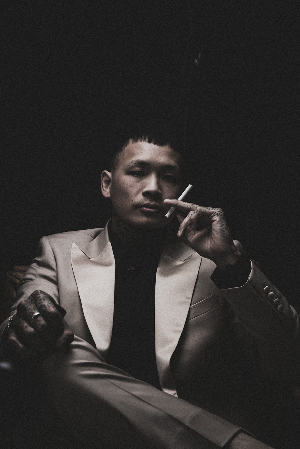 Person in elegant suit at upscale venue